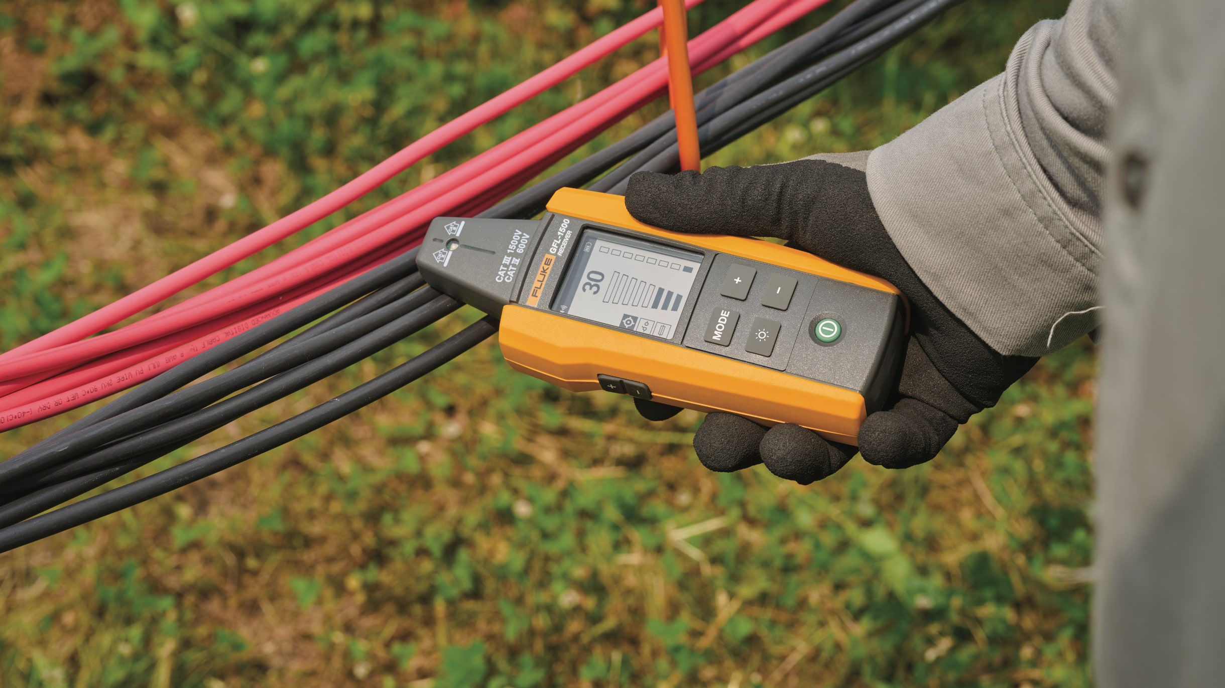 Transmitter being carried with shoulder strap